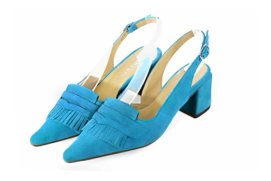 French elegance and refinement for these turquoise blue dress slingback shoes, 
                available in many subtle leather and colour combinations. Fans of originality will appreciate the fringes and the "Offbeat Rock" side.
To be personalized or not, with your materials and colors.  
                Matching clutches for parties, ceremonies and weddings.   
                You can customize these shoes to perfectly match your tastes or needs, and have a unique model.  
                Choice of leathers, colours, knots and heels. 
                Wide range of materials and shades carefully chosen.  
                Rich collection of flat, low, mid and high heels.  
                Small and large shoe sizes - Florence KOOIJMAN